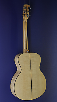 You`s, glossy finished Acoustic Guitar in Grand Auditorium shape with solid spruce top and maple on back and sides, with pickup, back view