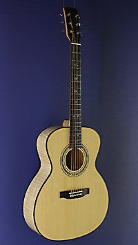 You`s, glossy finished Acoustic Guitar in Grand Auditorium shape with solid spruce top and maple on back and sides, with pickup