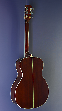 You`s, sunburst finished Acoustic Guitar in OM shape with solid spruce top and mahogany on back and sides, with pickup, back view
